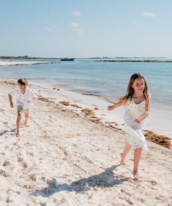 Kristina’s kids racing along the beach