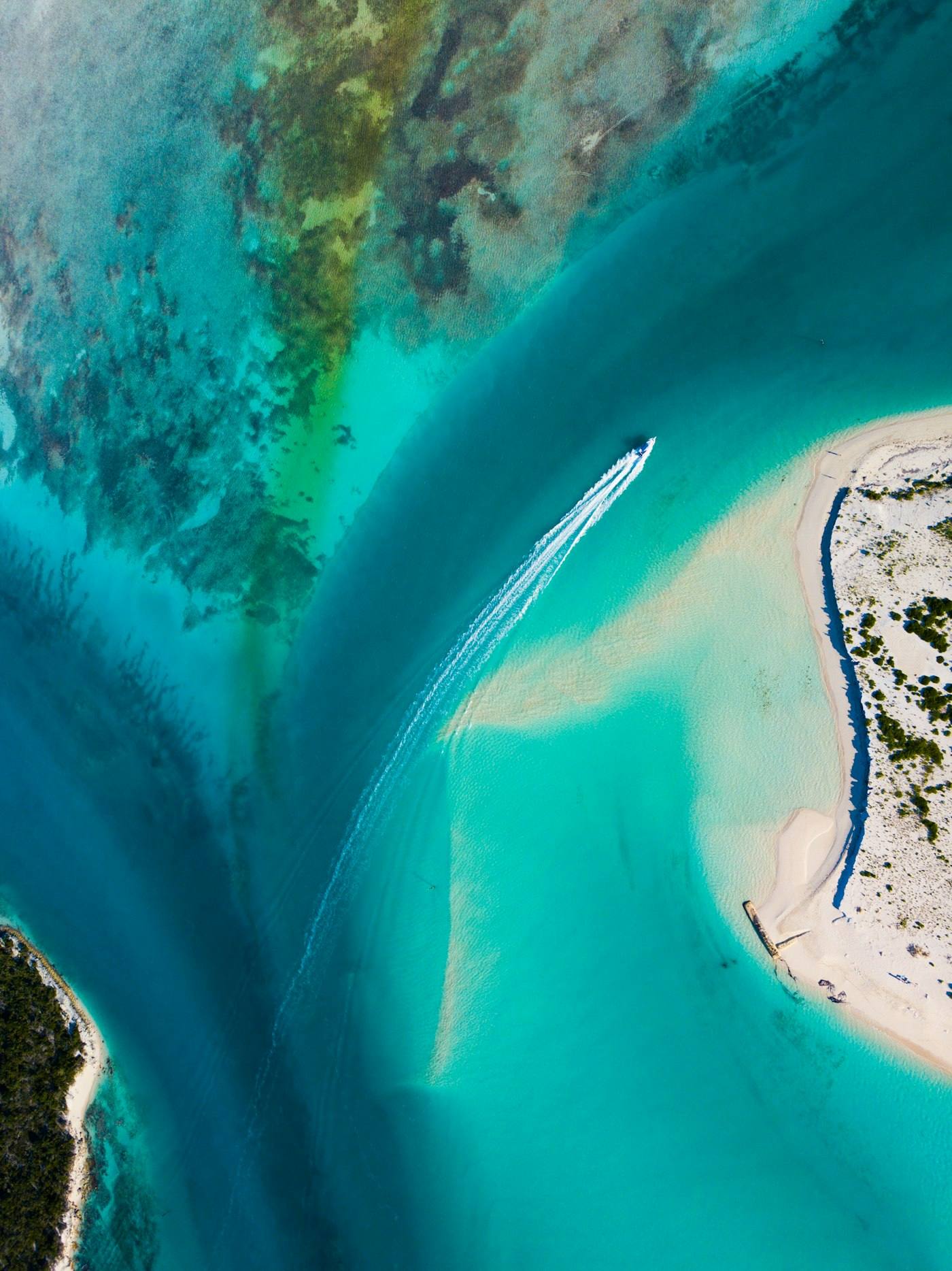 Aerial view of turquoise water and reef in the Turks and Caicos Islands