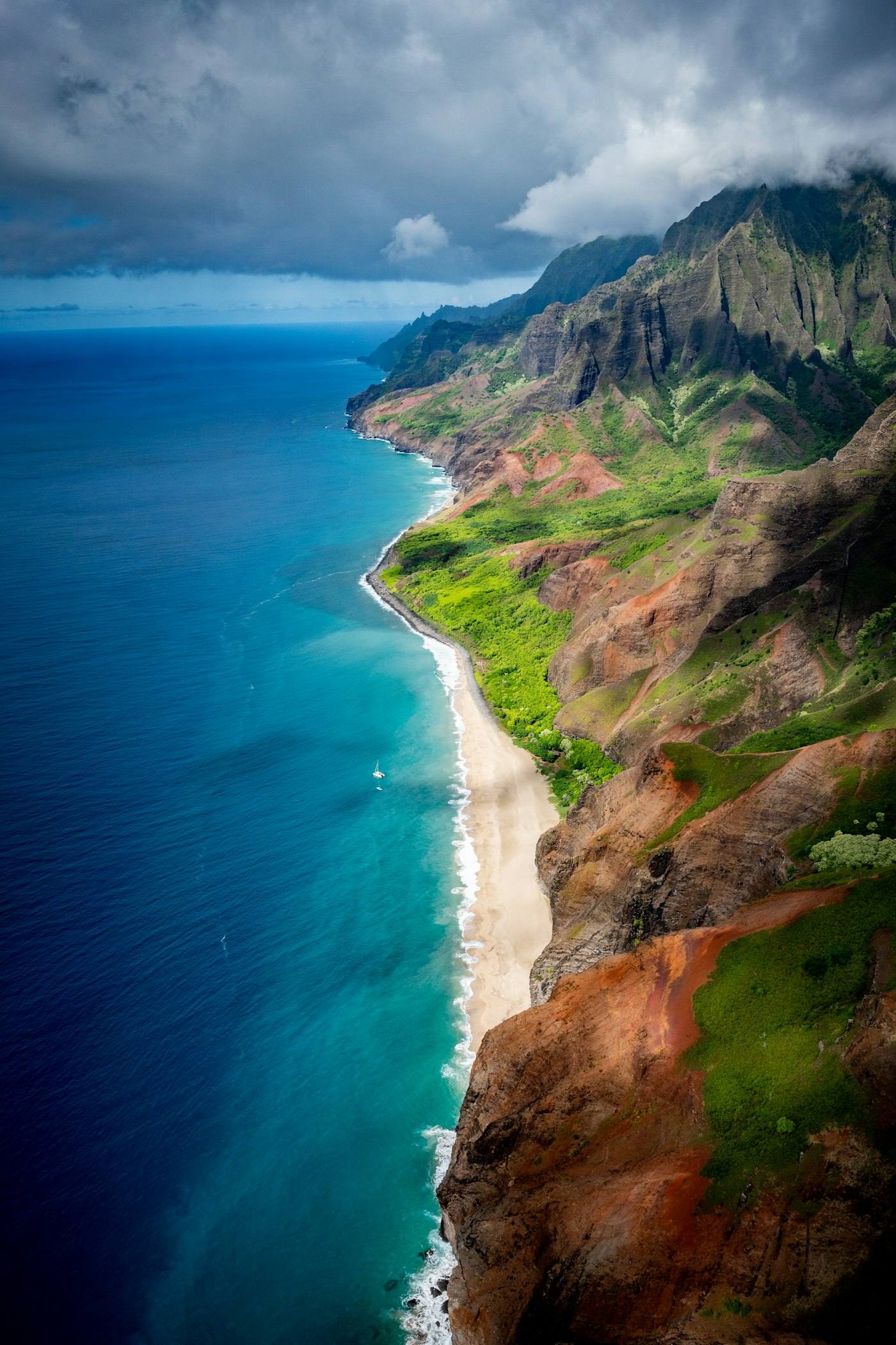 Aerial view of the green cliffs of the Na Pali Coast on Kauai
